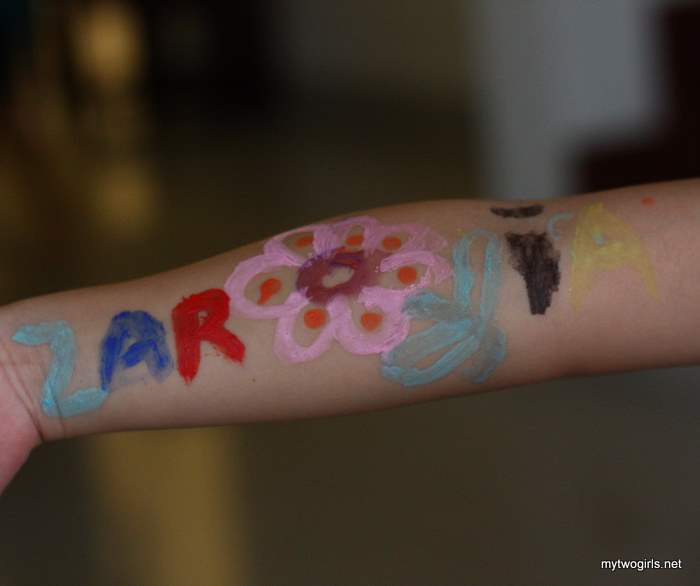 Zaria's arm painted by Jelly